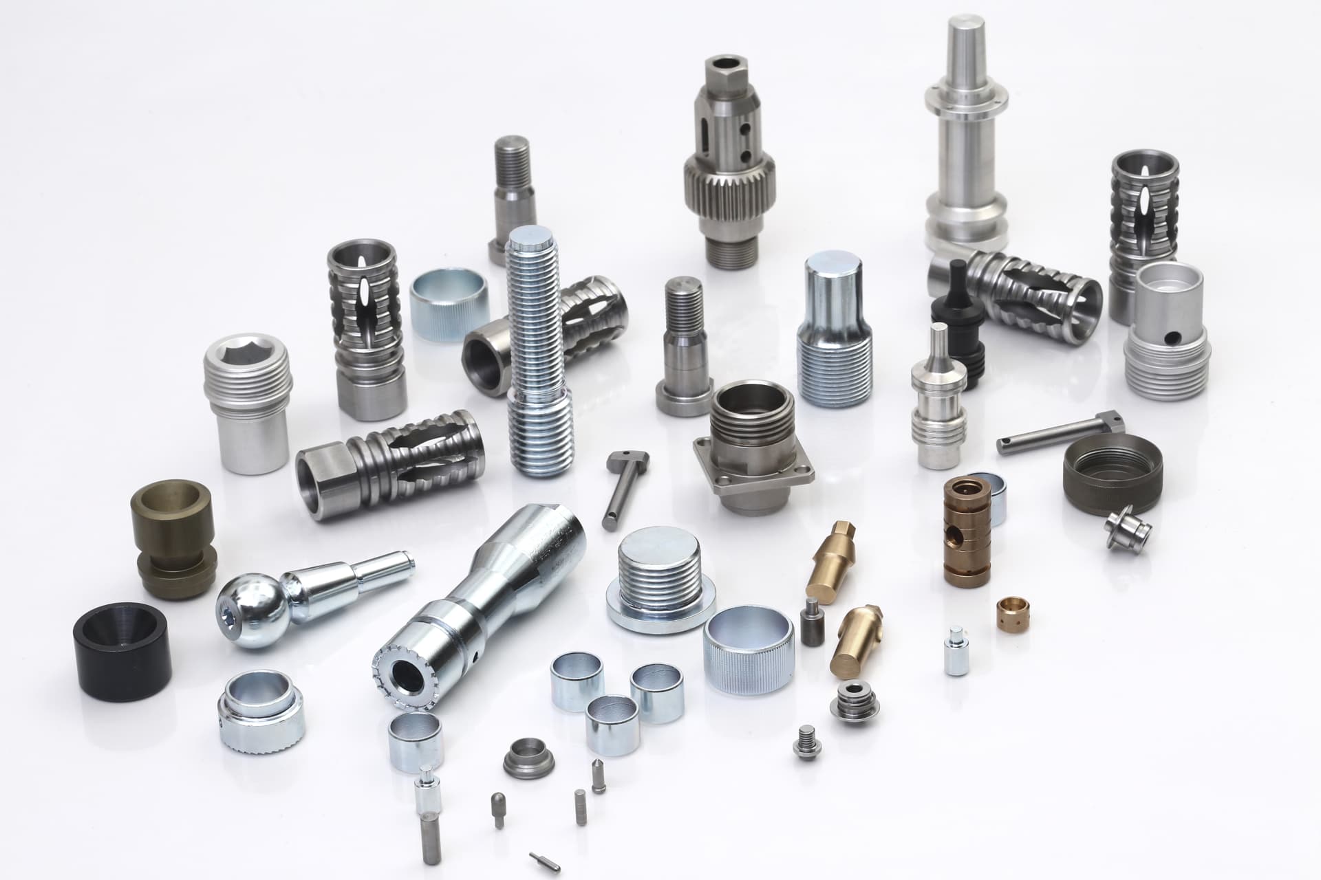 Range of HEPTEKNIK precision turned components in steel, stainless steel and brass